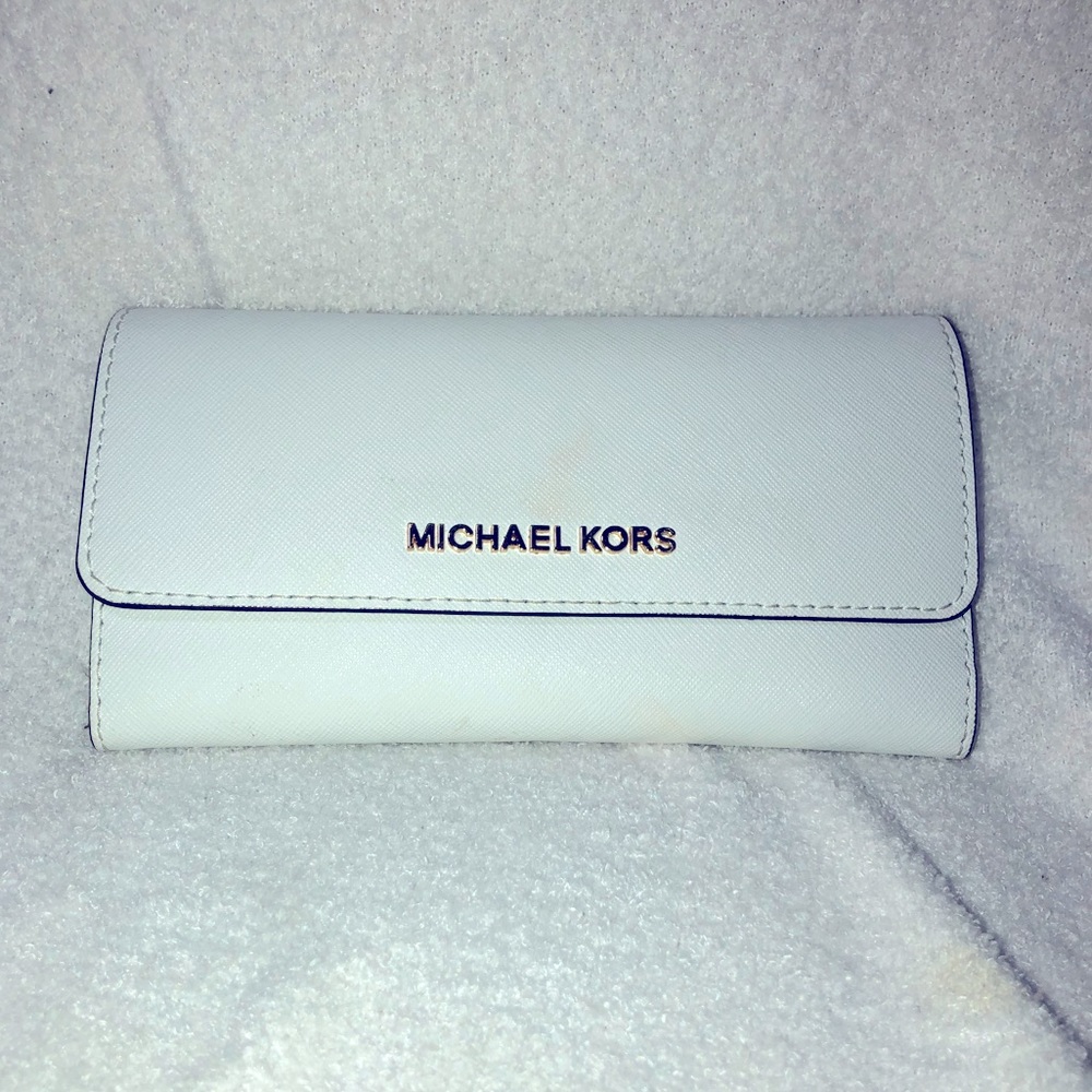 Michael Kor’s white leather trifold wallet